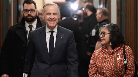 Prime Minister Mark Carney with latest floor-crosser, Nunavut MP Lori Idiot, formerly of the NDP