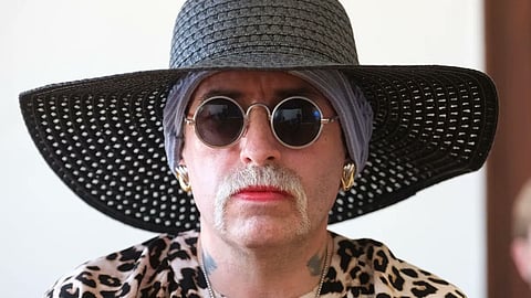 German neo-Nazi Sven Liebich dressed as a woman in court