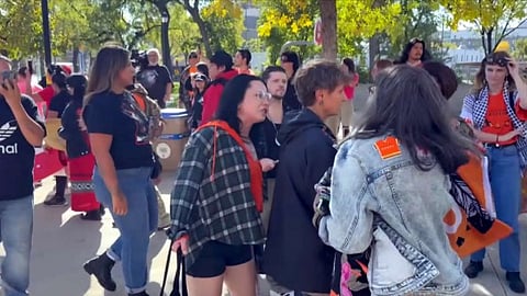 Widdowson accosted in crowd