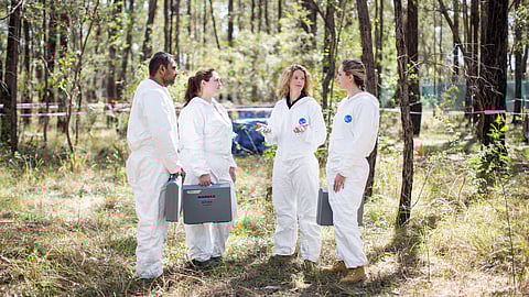 Dr. Shari Forbes and her colleagues on a forensic farm in Australia