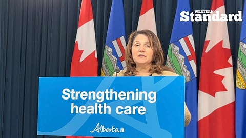 Minister of Primary and Preventative Health Services Adriana LaGrange speaking with reporters. 