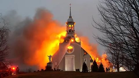 A major fire has decimated a 92-year-old church in Saint-Romain, Quebec, prompting a large response from local emergency crews and heated online speculation.