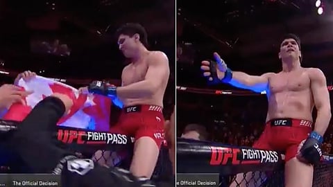 Canadian UFC fighter Mike Malott gets the Canadian flag ripped from his hands by UFC official after victory in Winnipeg