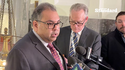 Naheed Nenshi speaking to reporters. 