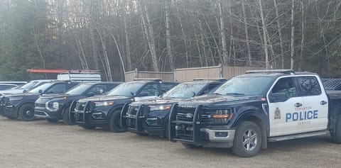 EPS police vehicles parked at a Centurion Project event. 