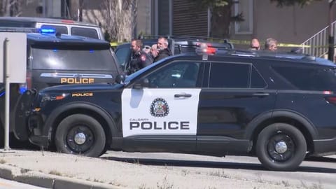 Two children found dead inside Jeep in Calgary intersection; man in custody