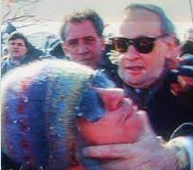 Former PM Chretien gives protester Shawinigan Handshake