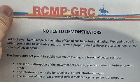 RCMP threatens Emergencies Act measures for Sask. protesters parked on the side of the road