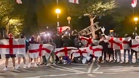UK riots and protests UK flags migrants 