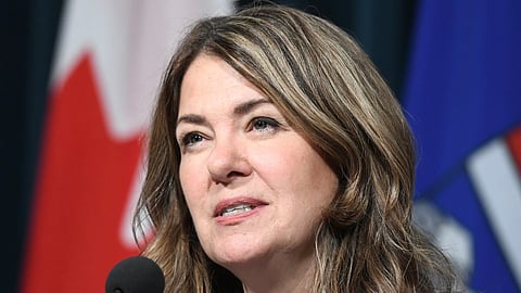 Alberta Premier Danielle Smith speaks with reporters