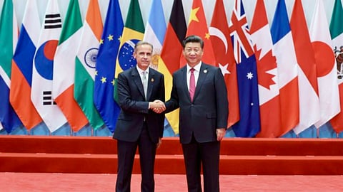 Chinese President Xi Jinping welcomes Mark Carney to the opening of the G20 Summit on September 4, 2016. 