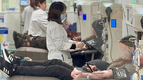 Donating plasma at a Grifols clinic 