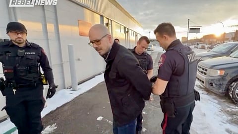 Derek Reimer being arrested 
