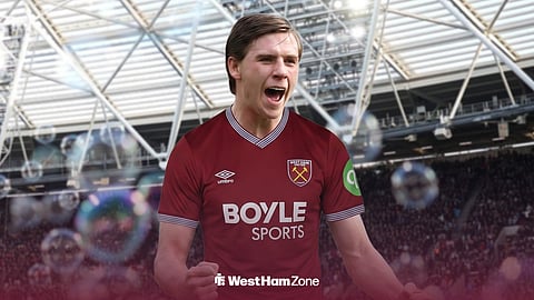 Sydie Peck in a West Ham United FC shirt, while celebrating in front of the London Stadium.