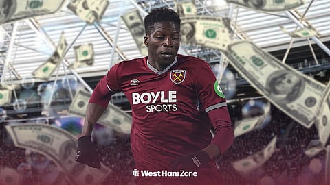 West Ham ace Mohamadou Kante with money flying around him.