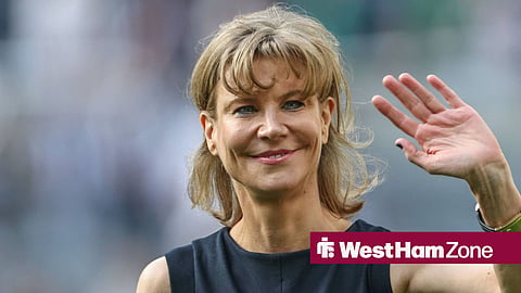 Amanda Staveley waving towards someone