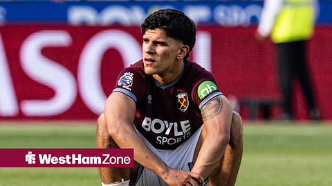 Mateus Fernandes crouching on the floor for West Ham