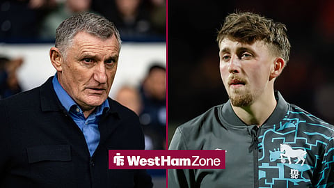 Dan Neil and Tony Mowbray looking on