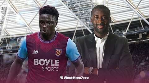 Mory Gbane in a West Ham kit at London Stadium with Yaya Toure beside him