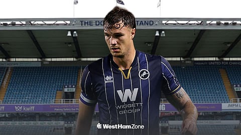 Jake Cooper in a Millwall kit, with The Den behind him