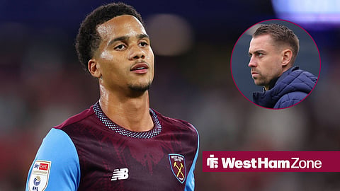 Divine Mukasa playing for West Ham looking at Tonda Eckert looking annoyed